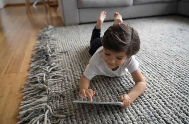 Girl lying on rug | Lake Forest Flooring