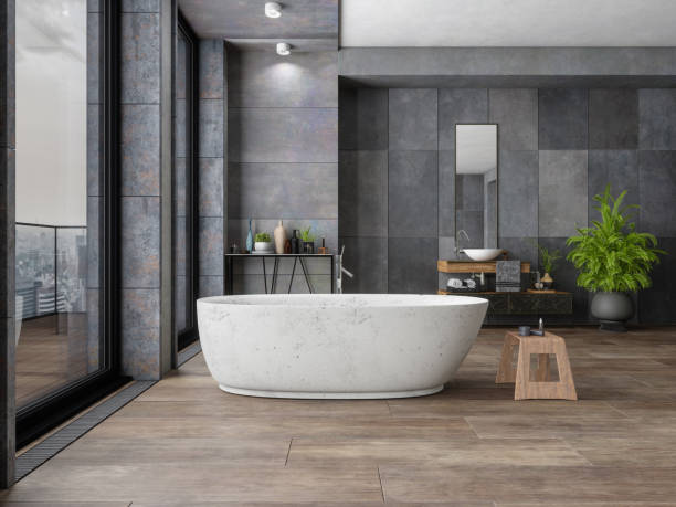 Bathroom tile dark flooring with bath tub | Lake Forest Flooring