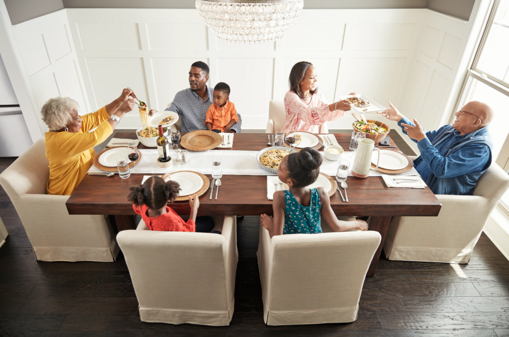 Family having breakfast at the dining table | Lake Forest Flooring